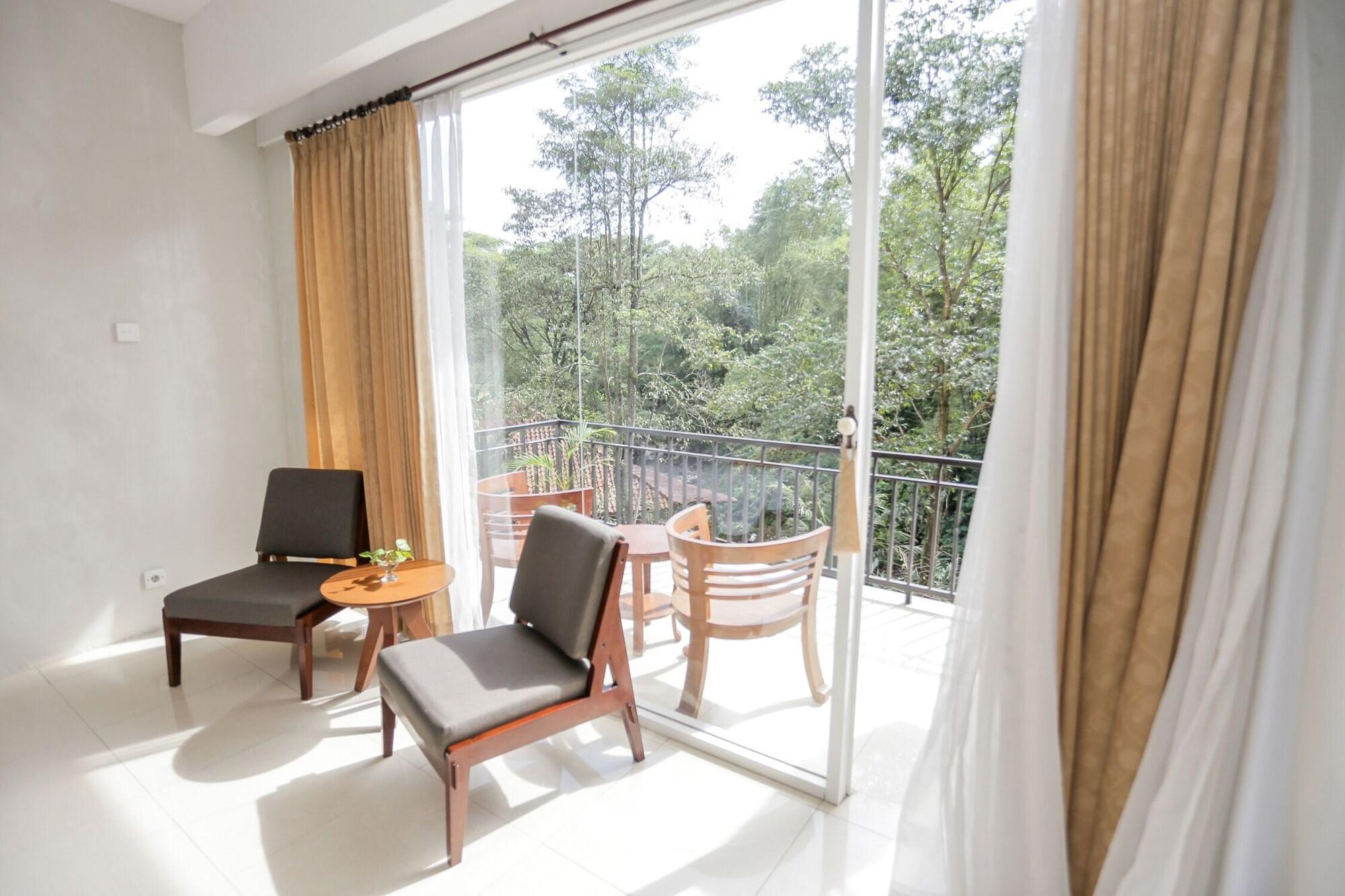 Ubud Hotel & Cottages Маланг Екстериор снимка